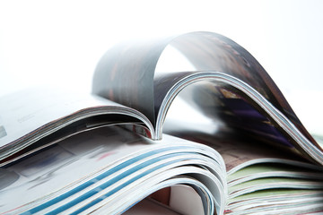 stack of magazines on the table