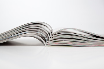 stack of magazines on the table