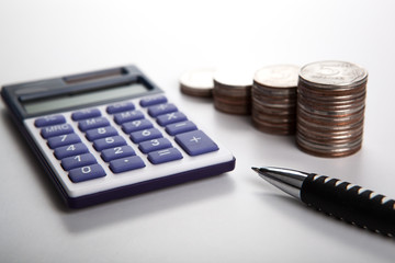 handful of Russian rubles with calculator