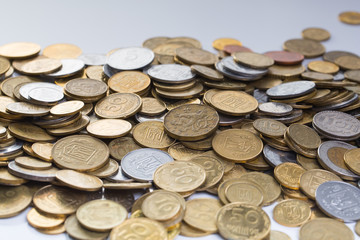 Pile of coins isolated on white background