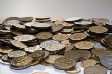 Pile of coins isolated on white background