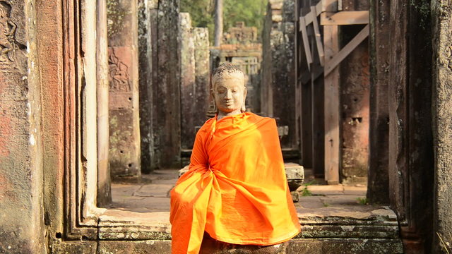 Statue of Robed Buddha in Ancient Temple  - Angkor Wat Temple Cambodia