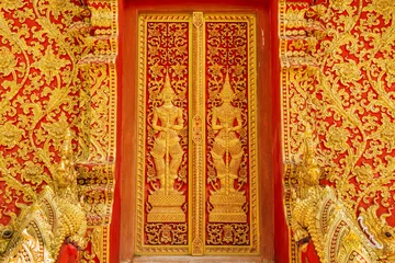 Wall murals Temple art door carving guardian giant in the temple ,Thailand