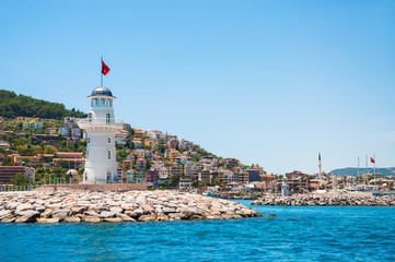 Fototapeta na wymiar Lighthouse in the port of Alanya, Turkey