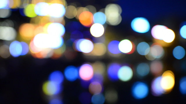 Blurred  Colorful City Lights Reflecting off Water - Hanoi Vietnam 