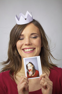 Woman wearing a paper crown