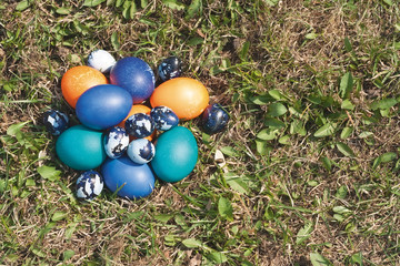 Some colored Easter eggs on the lawn