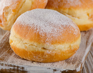 Donuts with powdered sugar.