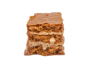 The broken pieces of chocolate biscuit isolated on white