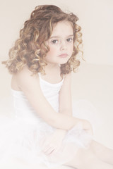 Pensive girl in studio