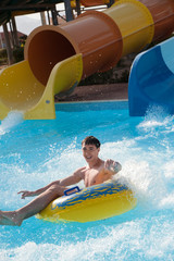 man rides in the water park