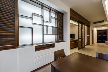 Dining room interior in modern bright apartment