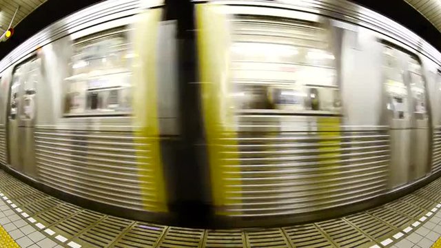 Fisheye - Subway Train Enters the Station at Japan Metro Rail Station