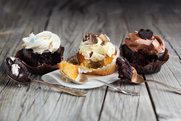 Chocolate cupcakes on wooden table