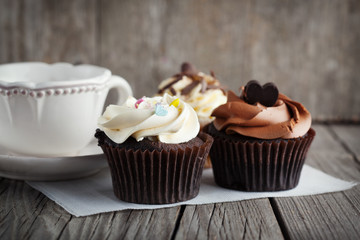 Chocolate cupcake on wooden table