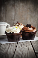 Chocolate cupcake on wooden table