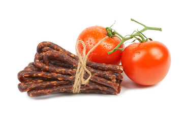 Bulgarian traditional sausage Bireni, With Ripe red tomatoes. Is