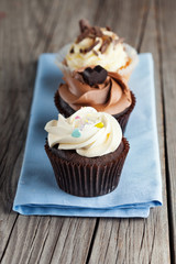 Chocolate cupcake on wooden table