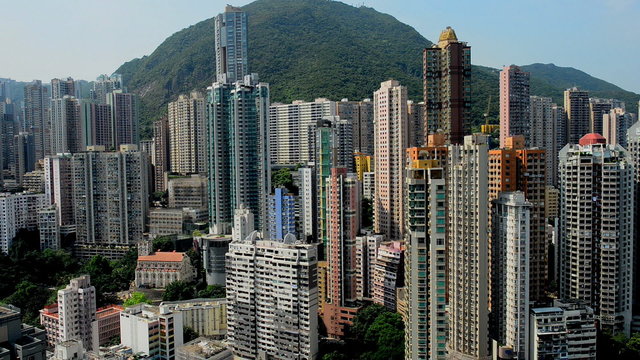Pan Up of the Hong Kong Skyline from Rooftop Location  - Hong Kong China
