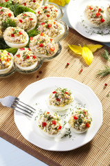 stuffed eggs with ham, red pepper and dill