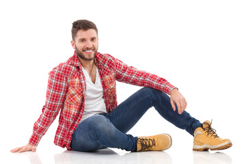 Relaxed man in lumberjack shirt