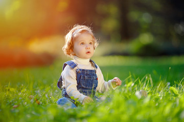 Child playing with tablet outdoors