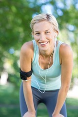 Fototapeta premium Pretty blonde jogging at the park