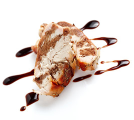 Chicken with balsamic sauce on a white background