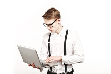 young man in glasses with laptop with emotion