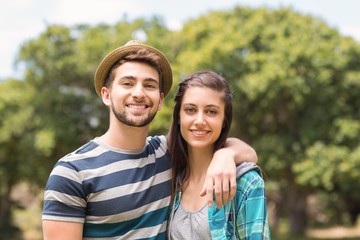 Obraz premium Young couple smiling at camera