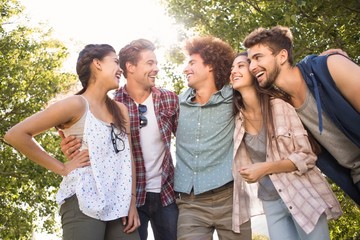 Happy friends in the park taking selfie