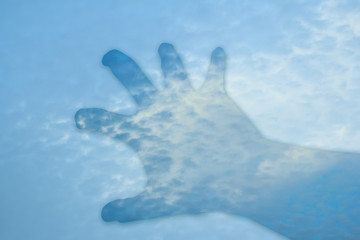 hand double exposure sky background