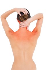 Rear view of a topless woman suffering from neck ache