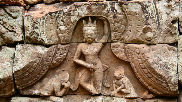 Stone Carving of Buddha Goddess on Temple Wall  - Angkor Wat, Cambodia
