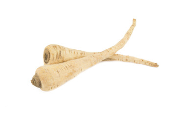 pair of parsley roots isolated on white background