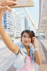 Pretty girl taking a selfie