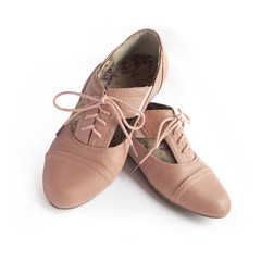 Pair of female shoe on white background