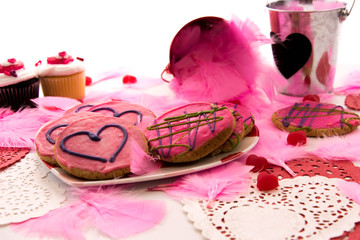 Valentines Day - pink cookies and cupcakes with hearts
