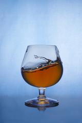 Cognac splash in glass