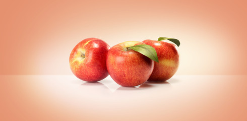 yellow red apples isolated on a colored background