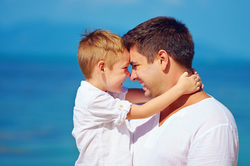 cute father and son embracing, family relationship