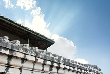 Fototapeta na wymiar white old wall of asian temple hill