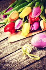 Easter setting with multicolor tulips