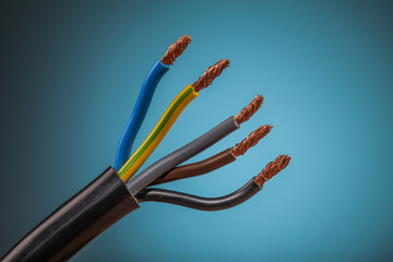 electric wire on blue background © mariusz szczygieł