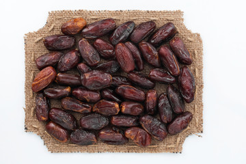 Figured frame made of burlap with dried date