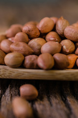 Raw peanut on wooden background