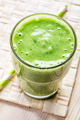 glass of green smoothie, top view