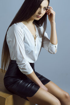 Female beauty concept. Portrait of fashionable young girl in cla