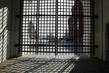 monastery gate, a narrow door the lattice