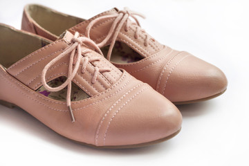 Pair of female shoe on white background